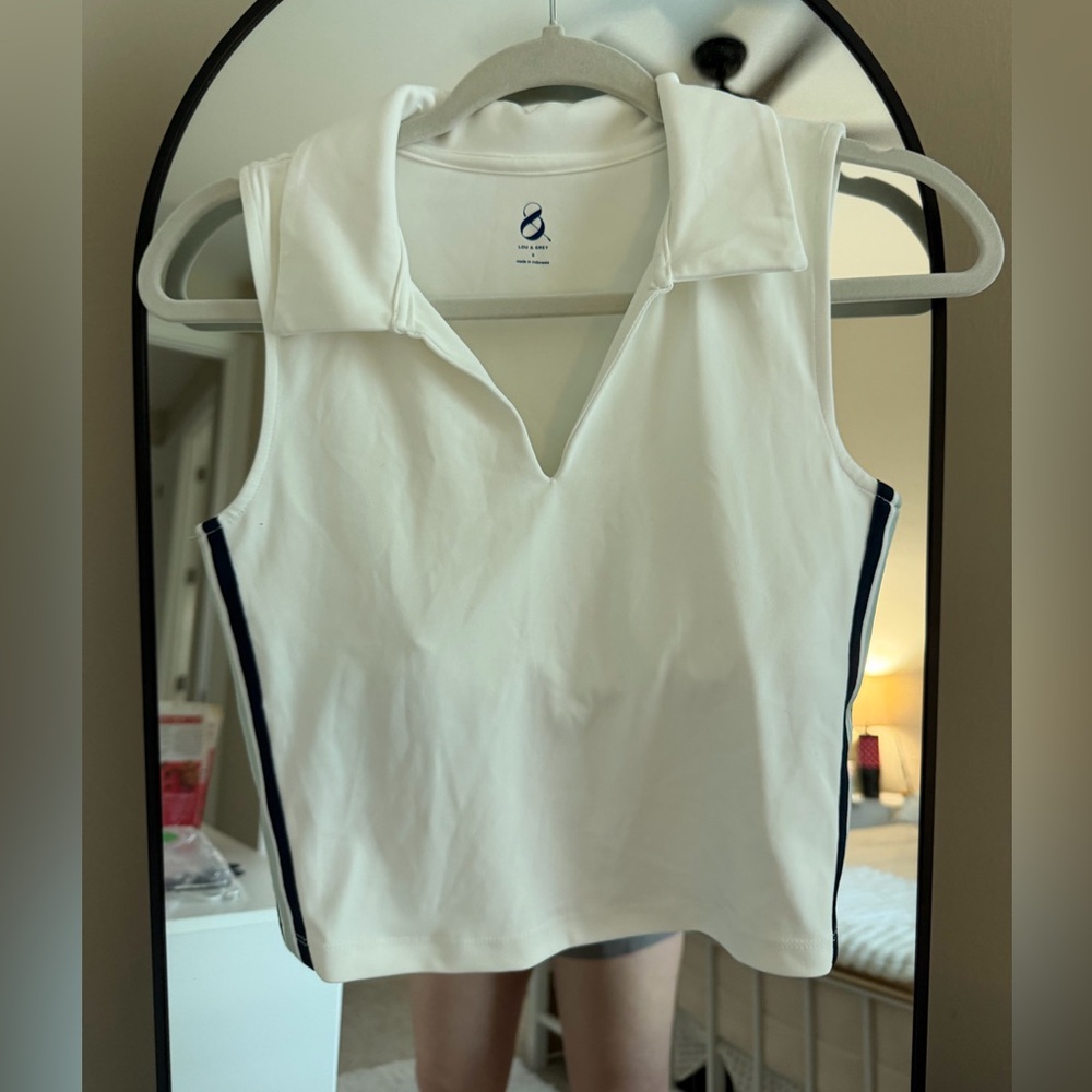 Sleeveless White Polo Crop Top with Navy Side Trim